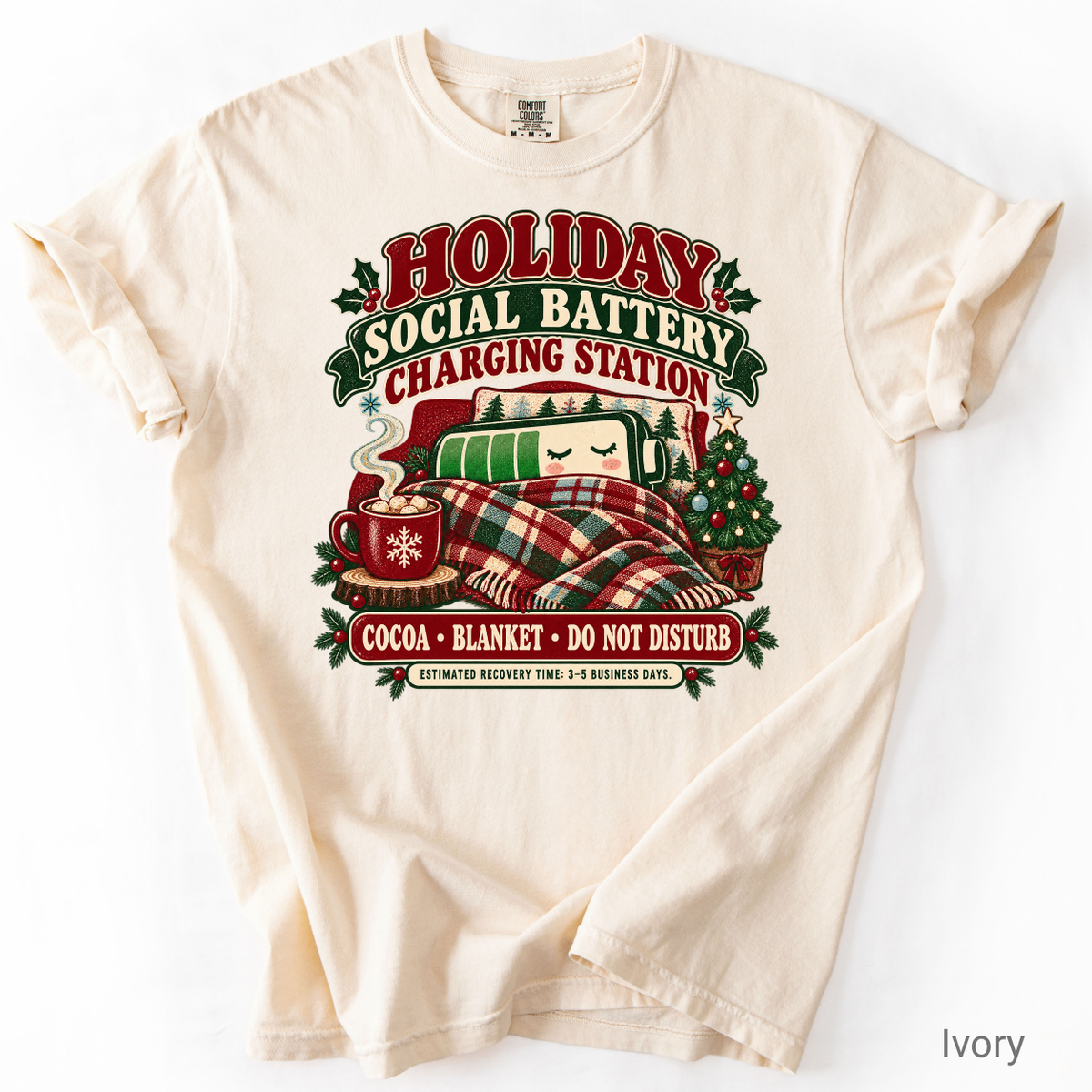 Holiday Social Battery Charging Station funny Christmas shirt with a sleepy battery, cocoa, plaid blanket and Christmas tree